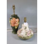 Two Moorcroft pottery tube-lined table lamps of baluster and squat form with Spring Blossom design