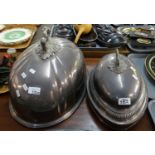Two large silver plated cloches with ornate handles and inscribed coat of arms. (2) (B.P. 21% + VAT)