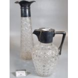 Hobnail cut baluster decanter or claret jug with silver mount and handle together with a similar cut