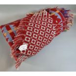 Dark red ground Welsh tapestry woollen geometric design blanket with fringed edge. (B.P. 21% + VAT)