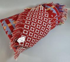Dark red ground Welsh tapestry woollen geometric design blanket with fringed edge. (B.P. 21% + VAT)