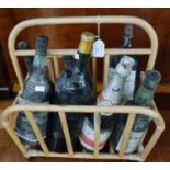 Collection of alcohol in distressed condition to include: Sandeman Port, Dom Perignon Champagne
