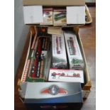 Collection of diecast 1:76 scale replica models of Great British Buses in original boxes together