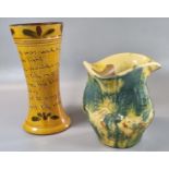 Ewenny pottery dimpled design vase with Welsh text together with another unusual pottery two handled