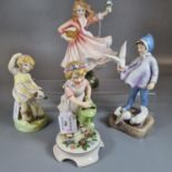 Royal Doulton bone china figurine 'Daddy's Joy' together with two Hummel figurines of young children