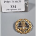 9ct gold Royal Navy crown and anchor pin badge. 2.5g approx. (B.P. 21% + VAT)