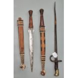 Late 19th century French sword bayonet, together with two tourist type jungle knives with leather