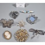 Collection of costume and filigree brooches: ribbons, butterflies, Art Nouveau style etc. (B.P.