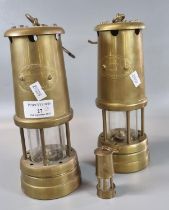 Two brass Miner's lamps marked 'Hockley' and a miniature miner's lamp. (3) (B.P. 21% + VAT)