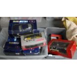 Two boxes of Revell and other diecast model vehicles, mainly 1:18 and 1:24 scale to include: BMW