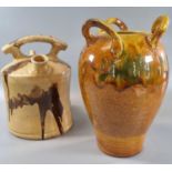Ewenny pottery slip glazed baluster three handled vase together with a pottery glazed waisted design