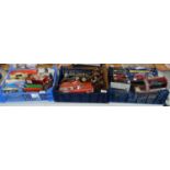 Three trays of assorted diecast model vehicles, in playworn and boxed condition, to include: Shell