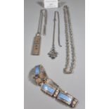 Bag of silver to include: silver ingot on chain, another silver chain with three feathers pendant,