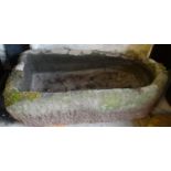 Large sandstone garden trough of arched form. 115cm long approx. (very heavy). (B.P. 21% + VAT)