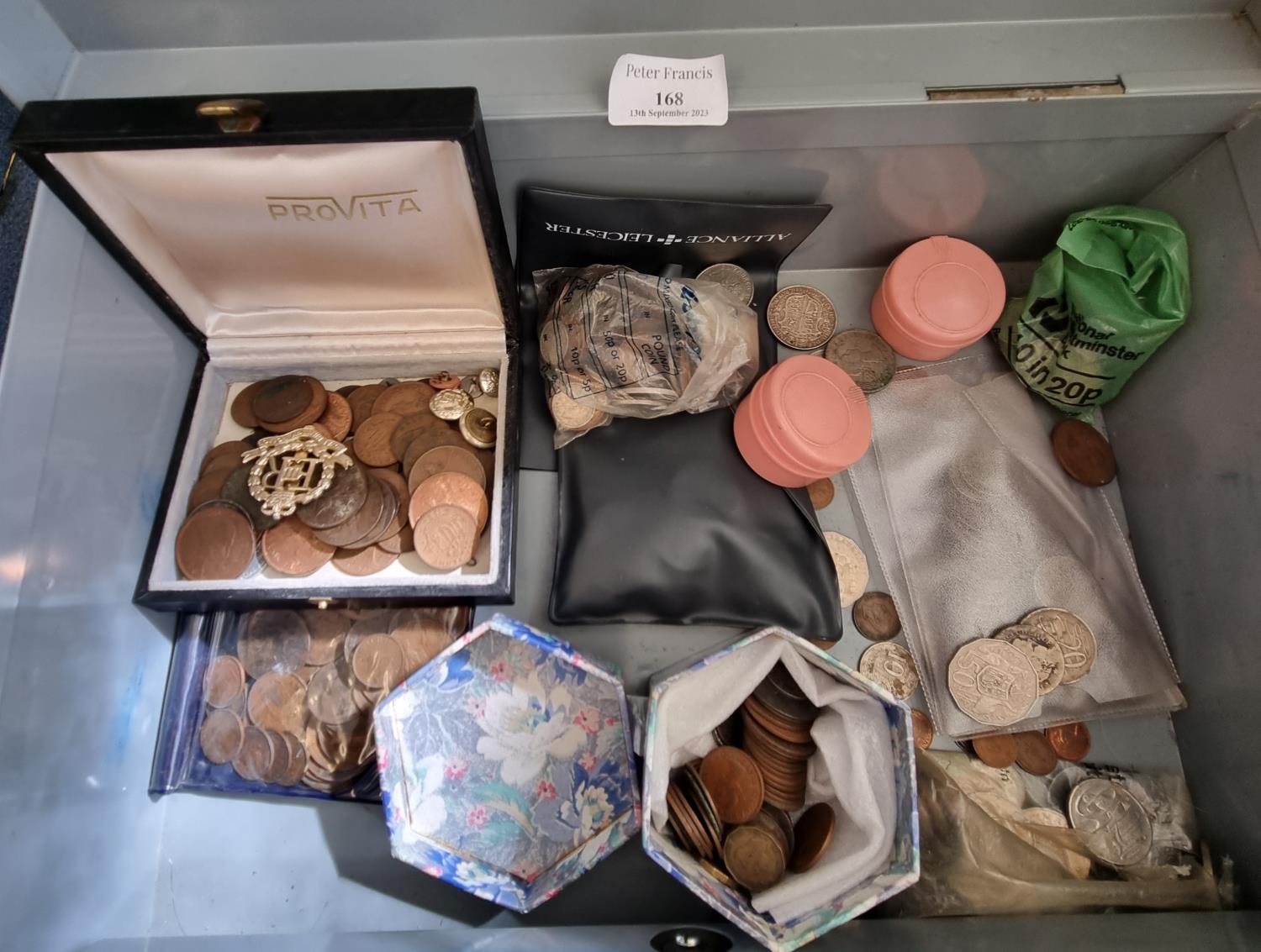 Tin box of assorted coinage, mainly GB, copper and some silver, Royal military Police badge etc. (