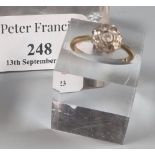 18ct gold and diamond flowerhead ring, missing one diamond. 2.3g approx. Size K. (B.P. 21% + VAT)