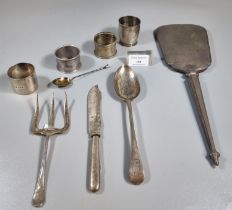Collection of silver items to include: early 20th century engine turned hand mirror, silver napkin