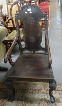 Chinese hardwood splat back ornately carved open elbow chair on shaped front legs. (B.P. 21% + VAT)