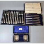 Cased set of silver salts (missing their two spoons) together with a cased set of six silver handled