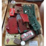 Box of Meccano pieces, some in vintage tins. (B.P. 21% + VAT)