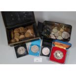 Two vintage tin money boxes revealing assorted GB and other coinage, to include: a Royal Mint silver