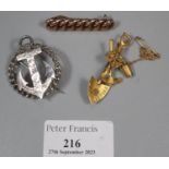 9ct gold curb link design brooch (4g approx). Together with a silver nautical anchor brooch and