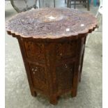 Middle Eastern/Islamic design hardwood ornately carved side or lamp table. (B.P. 21% + VAT)