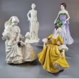 Two Royal Worcester ivory finish figurines to include: 'Millie' 1926 and 'The Wedding Day', together