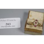 Victorian 18ct gold lozenge shaped ruby and seed pearl ring. Birmingham hallmarks. 2.7g approx. Ring