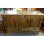 18th Century Welsh oak coffer, having three fielded ogee panels to the front, with two drawers, on