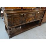 17th Century style carved oak sideboard with an arrangement of two central drawers, standing on