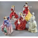 Four Royal Doulton bone china figurines to include; figurine of the year 1996 'Belle', 'Top O'the