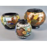 Three Gouda Dutch pottery items to include: globular vase, baluster vase and a posy vase and