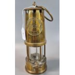 The Protector Lamp & Lighting Co Ltd Eccles brass miner's safety lamp. (B.P. 21% + VAT)