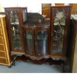 Late Victorian mahogany bow front ornate glazed display cabinet with under tier. (B.P. 21% + VAT)