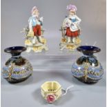 Pair of Royal Doulton stoneware squat vases decorated with relief bead, floral and swag work,