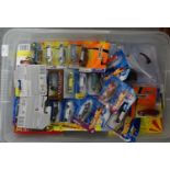 Plastic box of assorted diecast model vehicles to include: Hotwheels, Matchbox, Maisto, Corgi etc.