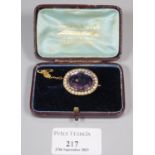 19th Century yellow metal amethyst and pearl brooch appearing in original leather box with retailers