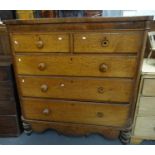 Large Victorian oak straight front chest of two short and three long drawers on baluster turned