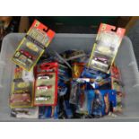 Large box of assorted diecast model vehicles, all in original packaging to include: a large