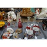 Two trays of china and glass to include: Limoges cabinet cups and saucer decorated with flowers,