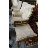 Modern elm Ercol upholstered four piece suite comprising two seater sofa, two matching armchairs and