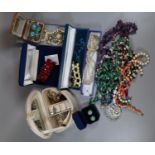 A collection of mainly costume jewellery and jewellery boxes to include: earrings, brooches, a