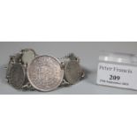 Silver seven coin bracelet featuring 50 Ore Danish coins. (B.P. 21% + VAT)