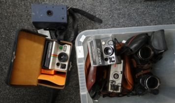 Box of cameras and other optical equipment to include: a cased Polaroid land camera 1000, Ensign box