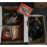 Box of assorted oddments to include: Action Man with accessories, Thomas the Tank Engine books and