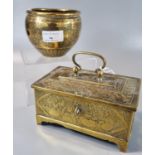 Probably Indian brass lidded casket decorated with seated figures, together with a brass engraved