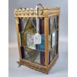 Gilded metal and stained and leaded glass four panelled lantern ceiling lightshade. 27cm high