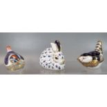 Three Royal Crown Derby bone china paperweights to include: recumbent hare and two birds. (3) (B.