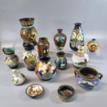 Collection of Gouda Dutch pottery items to include: vases, jugs, ashtray, small pin tray etc. All